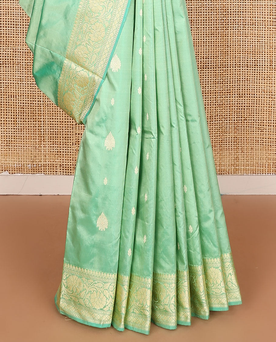 Green buttas kathan silk saree, floral creeper border, and intricately woven pallu