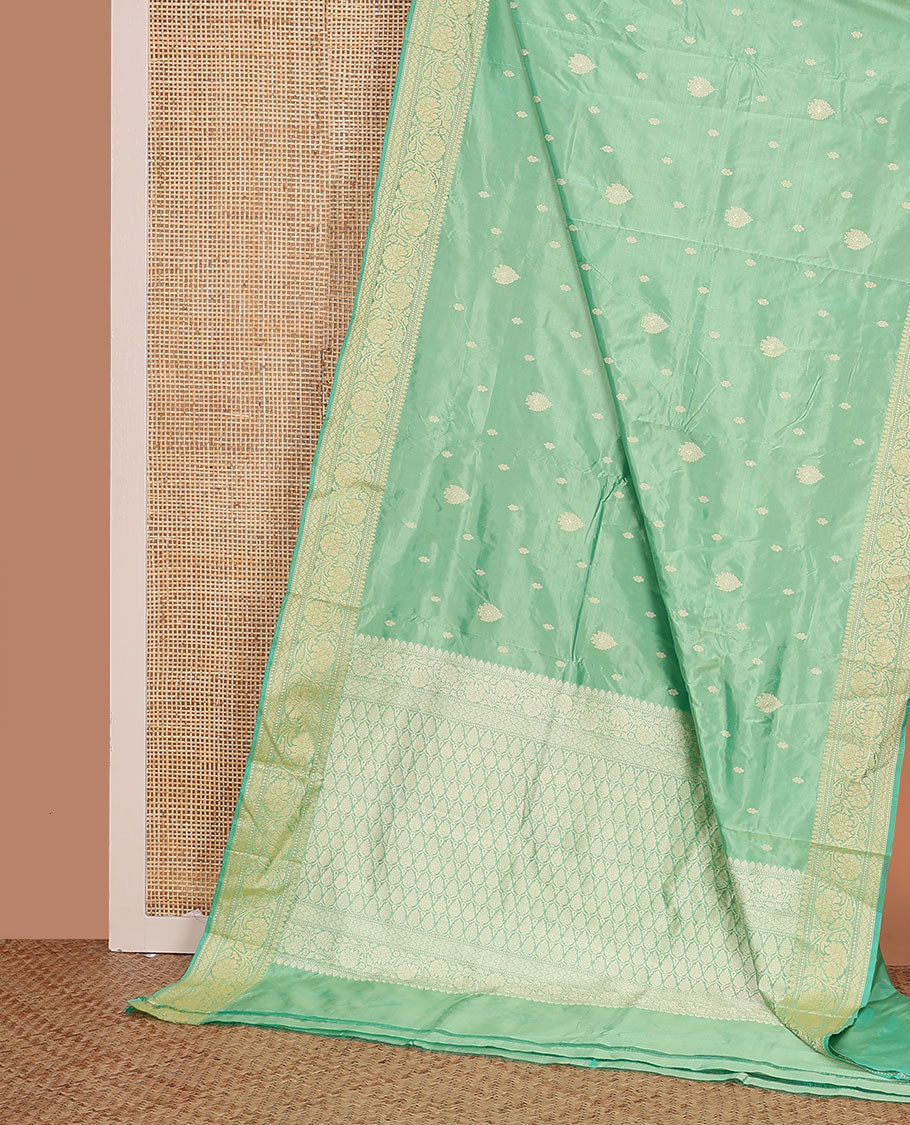 Green buttas kathan silk saree, floral creeper border, and intricately woven pallu