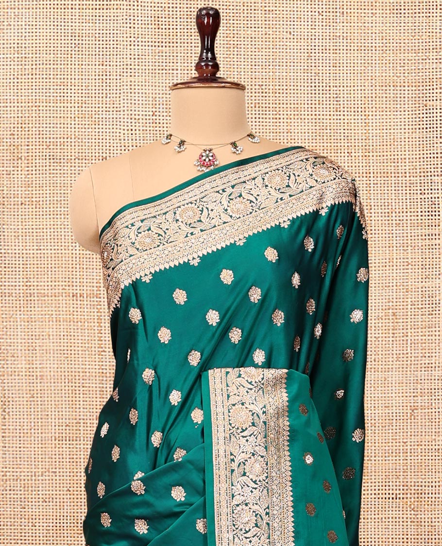 Bottle Green Banarasi Satin Saree, Woven with Floral Buttas, a Floral Creeper Border, Intricate Stonework Pallu, and a Matching Blouse