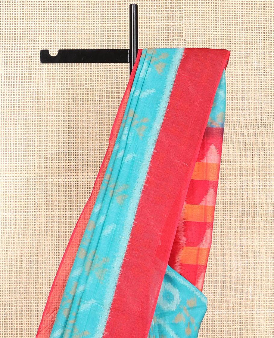 Light blue floral design ikkat cotton saree with contrast border & geometric design pallu