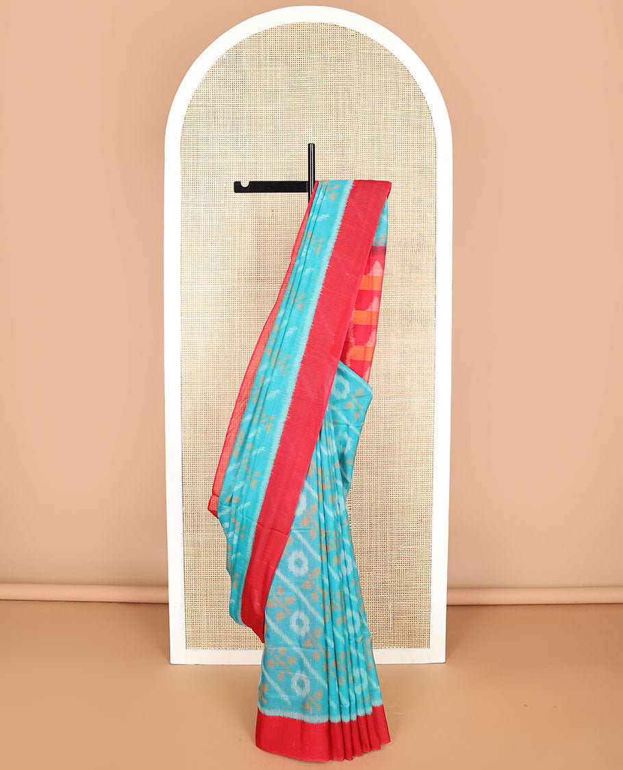 Light blue floral design ikkat cotton saree with contrast border & geometric design pallu