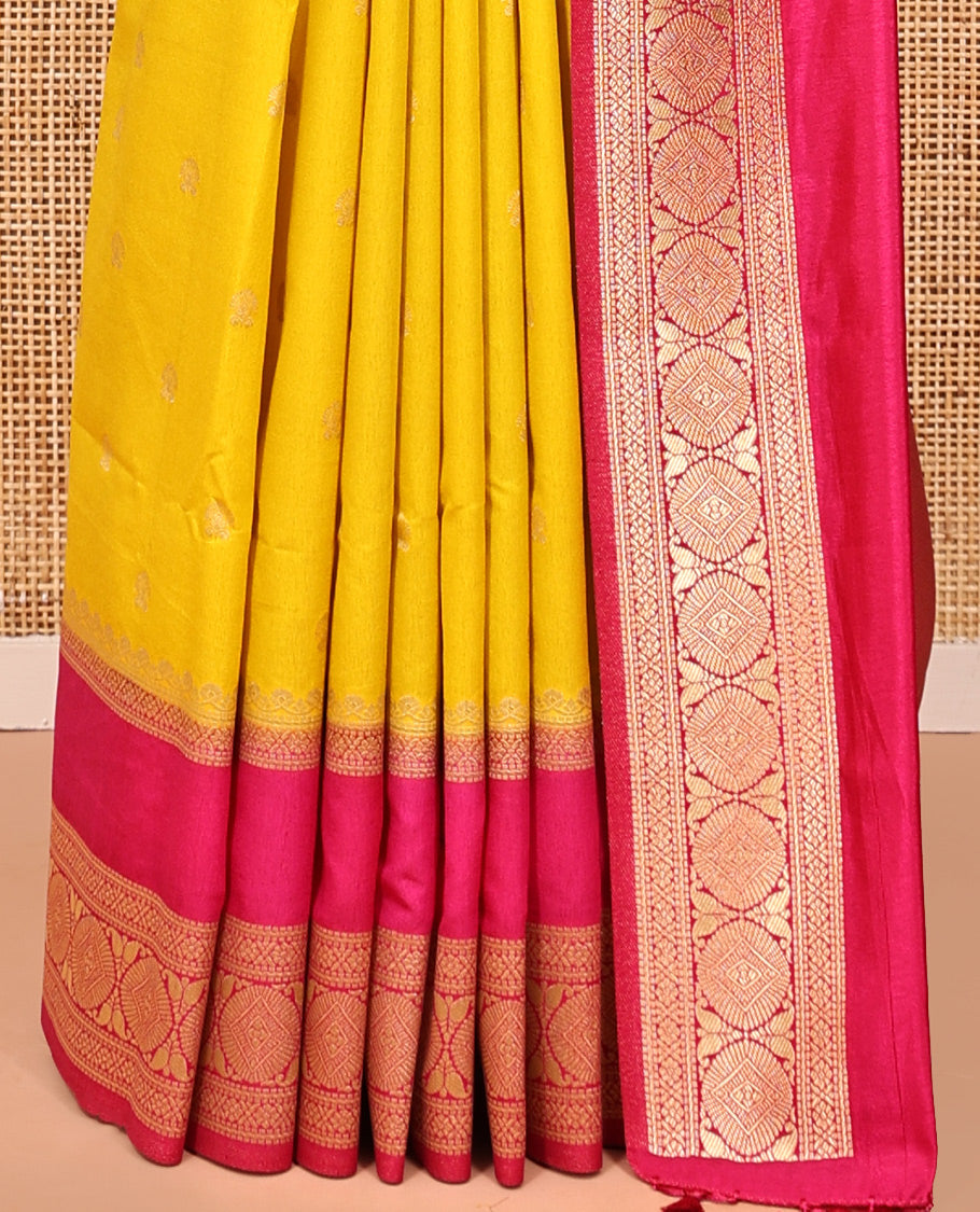 Mustard Yellow Dupion Silk Saree, Embellished with Buttas All Over Its Body, Complemented by Contrast Traditional Border of Paisleys and Chakram Designs, Intricately Designed Pallu, and Paired with a Contrast Blouse