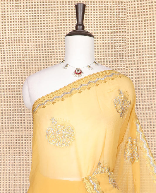 Yellow embroidered designer saree features peacock motifs in micro-stone, scallop thread & stone embroidery border