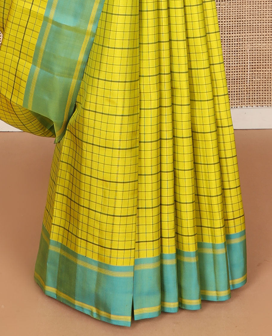 Yellow checked kanchipuram silk saree, contrast rettai pettu striped border & pallu of stripes