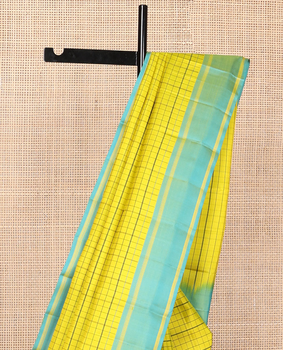 Yellow checked kanchipuram silk saree, contrast rettai pettu striped border & pallu of stripes