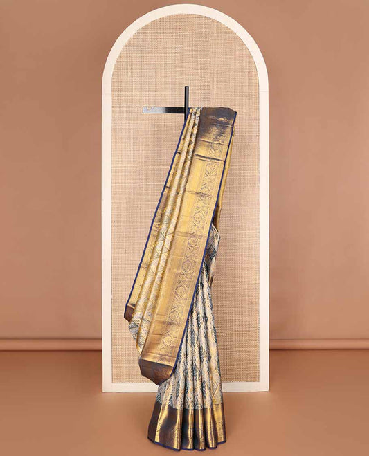 Grey zari jacquard tissue silk saree, contrast jaal pallu & border of thilakam mokku, kathir, kamalam & floral designs