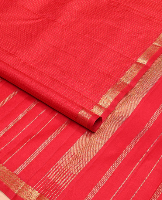 Red checked Kanchipuram silk saree, self-border of thilakam mokku,muthu, diamond & chakram designs & seppu rekku pallu