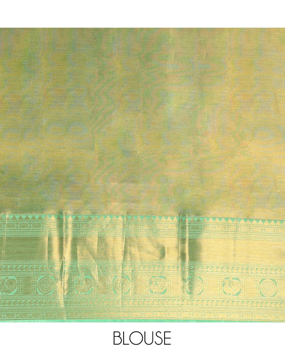 Green Kanchipuram Tissue Silk Saree, Elevated with Jacquard Design on Its Body, Complemented by a Contrast Border of Rekku, Kamalam, Banaras, Muthu, Manga, Mayil, and Mayil Kann Designs, Grand Ogee Pallu, and Paired with a Contrast Blouse