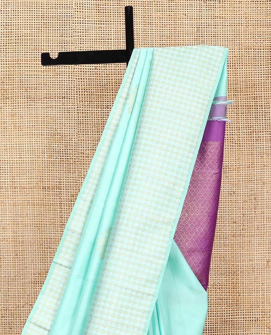 Turquoise zari buttas Kanchipuram silk saree, zari border of jaal designs, and contrast jaal pallu