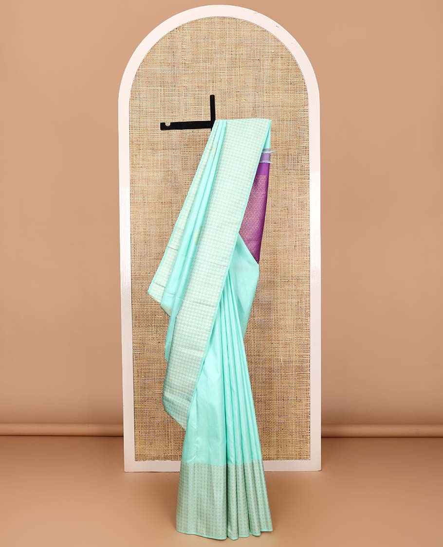 Turquoise zari buttas Kanchipuram silk saree, zari border of jaal designs, and contrast jaal pallu