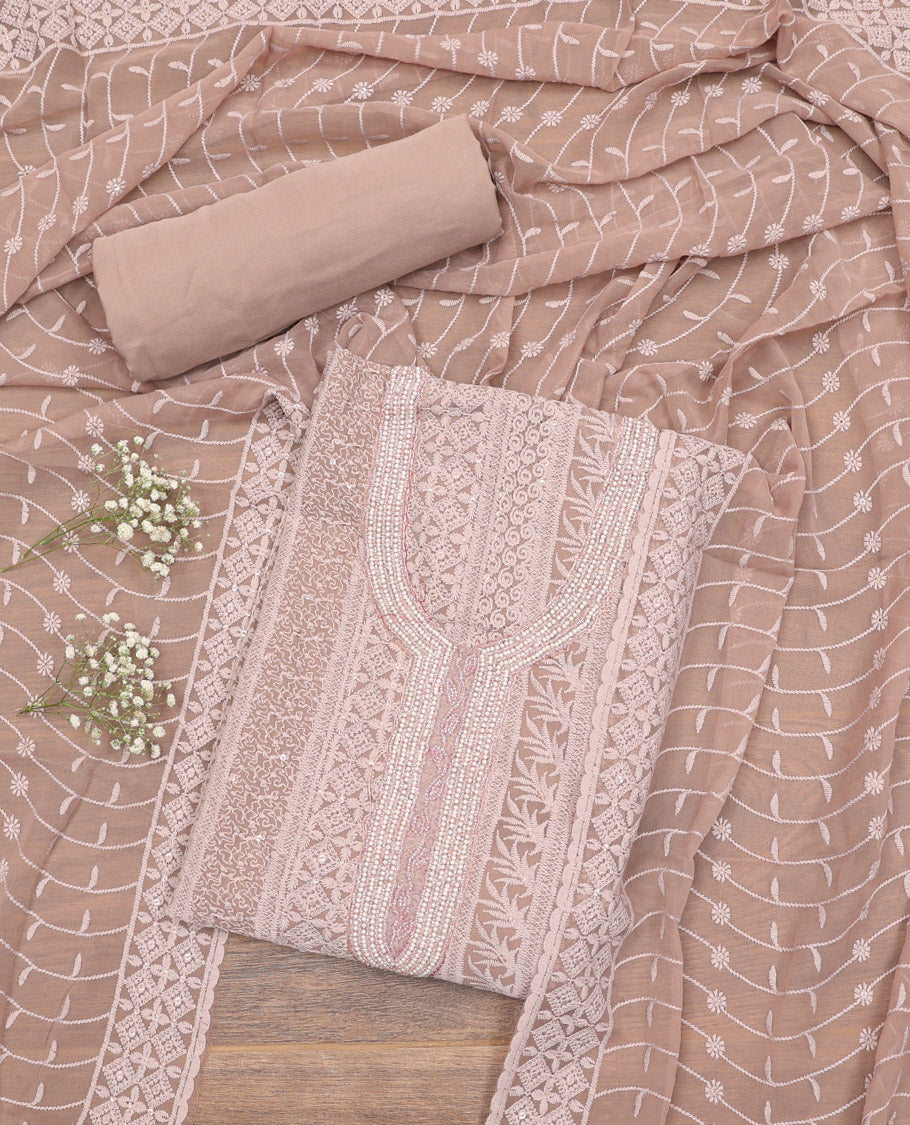 Pale Brown Material Chudidar Set, Ornamented with Chikankari-Style Embroidery and Neck Work on Georgette Top, a Plain Santoon Bottom, and Paired with a Floral Vine Embroidery Georgette Dupatta
