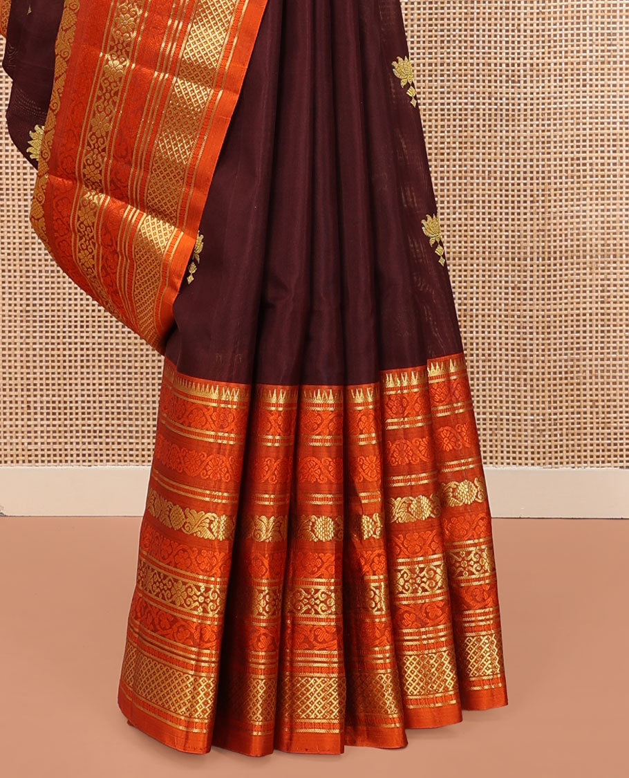 Brown Venkatagiri Silk Saree, Spotlighted with Zari Buttas All Over Its Body, Complemented by a Contrast Border of Temple, Floral, and Peacock-Eye Designs, Pallu of Peacock Eye Designs, and Paired with a Contrast Blouse