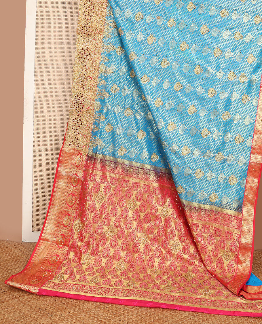 Blue jacquard stone embroidered silk saree, contrast scallop cut embroidered border & pallu of intricate design & embroidery