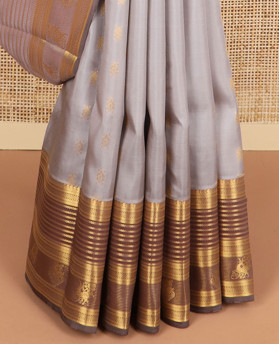 Grey floral buttas vasundhara elite silk saree with contrast intricate zari design border & ogee design pallu