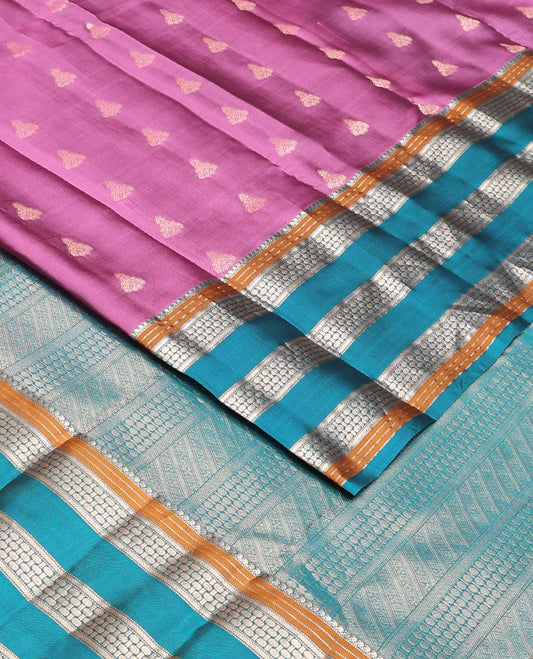 Purple zari buttas vasundhara silk mix saree, contrast rettai pettu border of manga mokku,muthu & rudraksham designs & pallu of geometric patterns