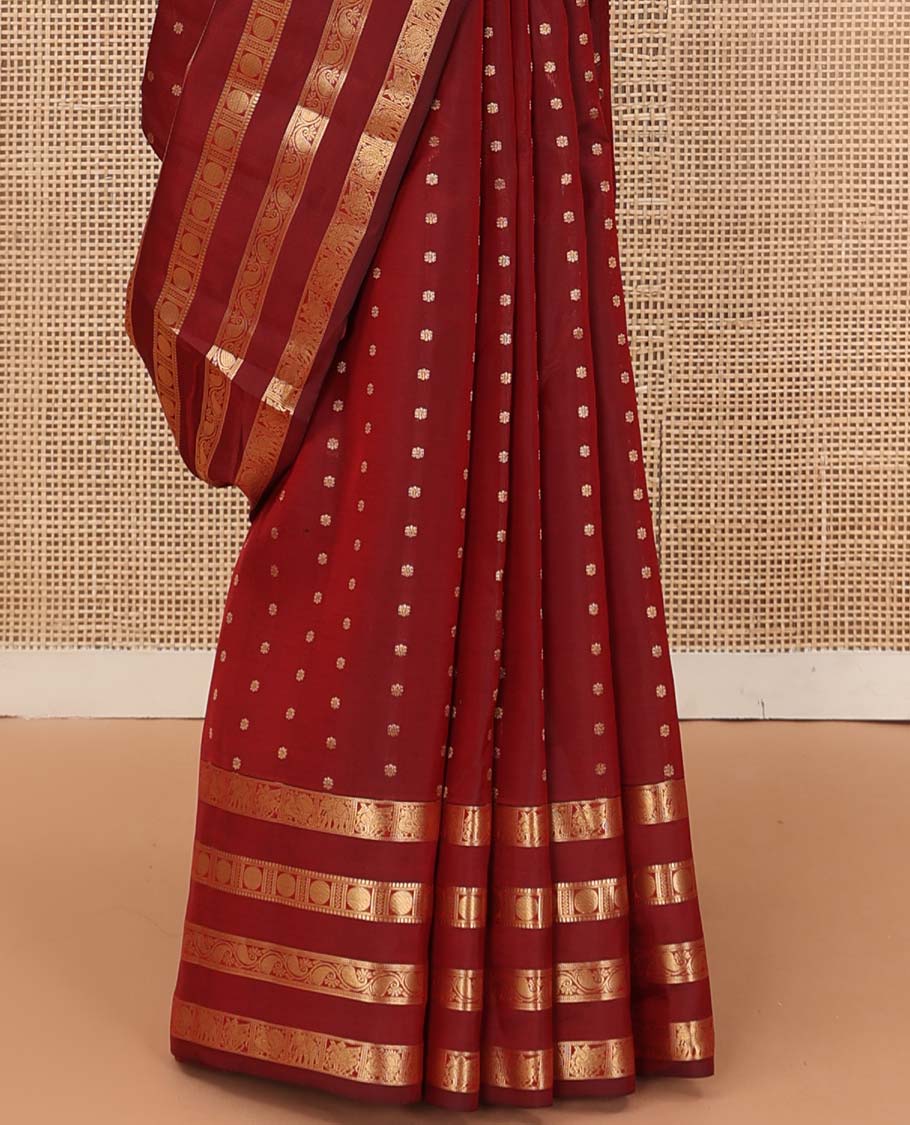 Red zari buttas Vasundhara silk mix saree, zari border of kuthirai, mayil, yaanai, neli, muthu, paisa, and kodi manga designs, and geometric pallu