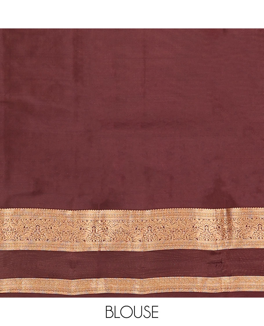 Rust Orange Vasundhara Lite-Silk Mix Saree Showcasing Mayil Buttas, Complemented with a Contrast Rettai Pettu Border Featuring Muthu, Diamond, and Mayil Designs, Adorned with Jaal Pallu, and a Contrast Blouse
