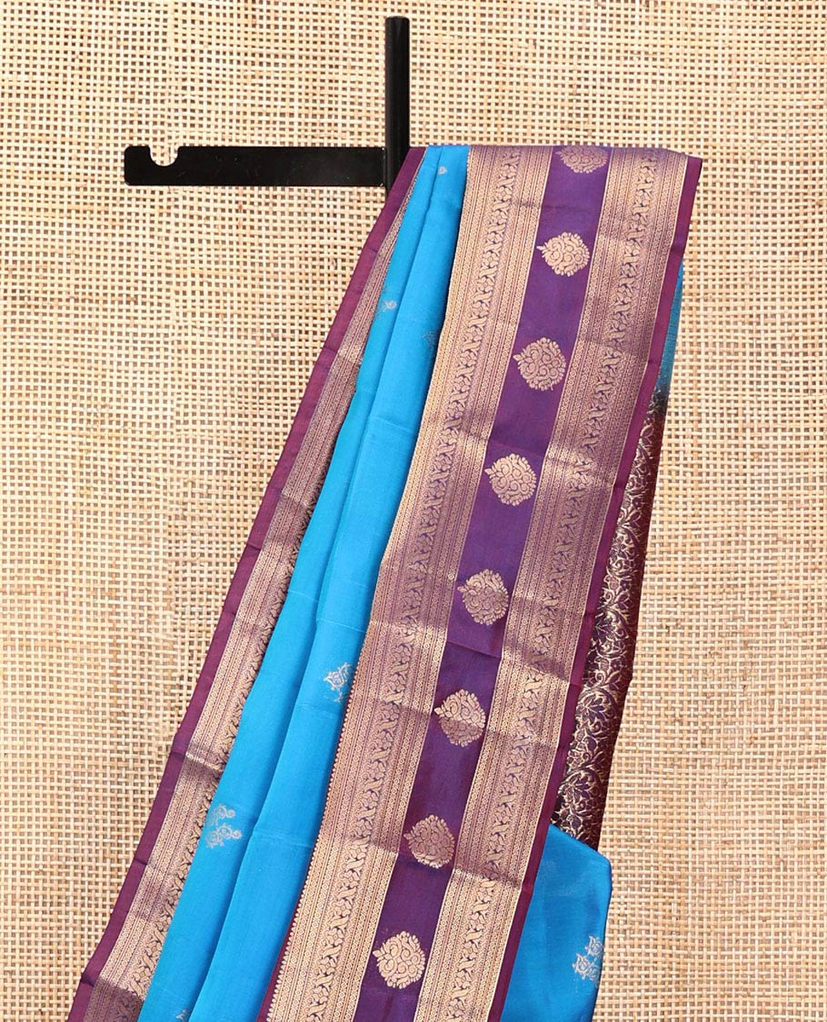 Blue Vasundhara Lite Silk Mix Saree, Elevated with Zari Buttas All Over Its Body, Complemented by a Contrast Border of Rekku, Diamond, Cross Kamalam and Zari Designs, Grand Floral Design Pallu, and Paired with a Contrast Blouse