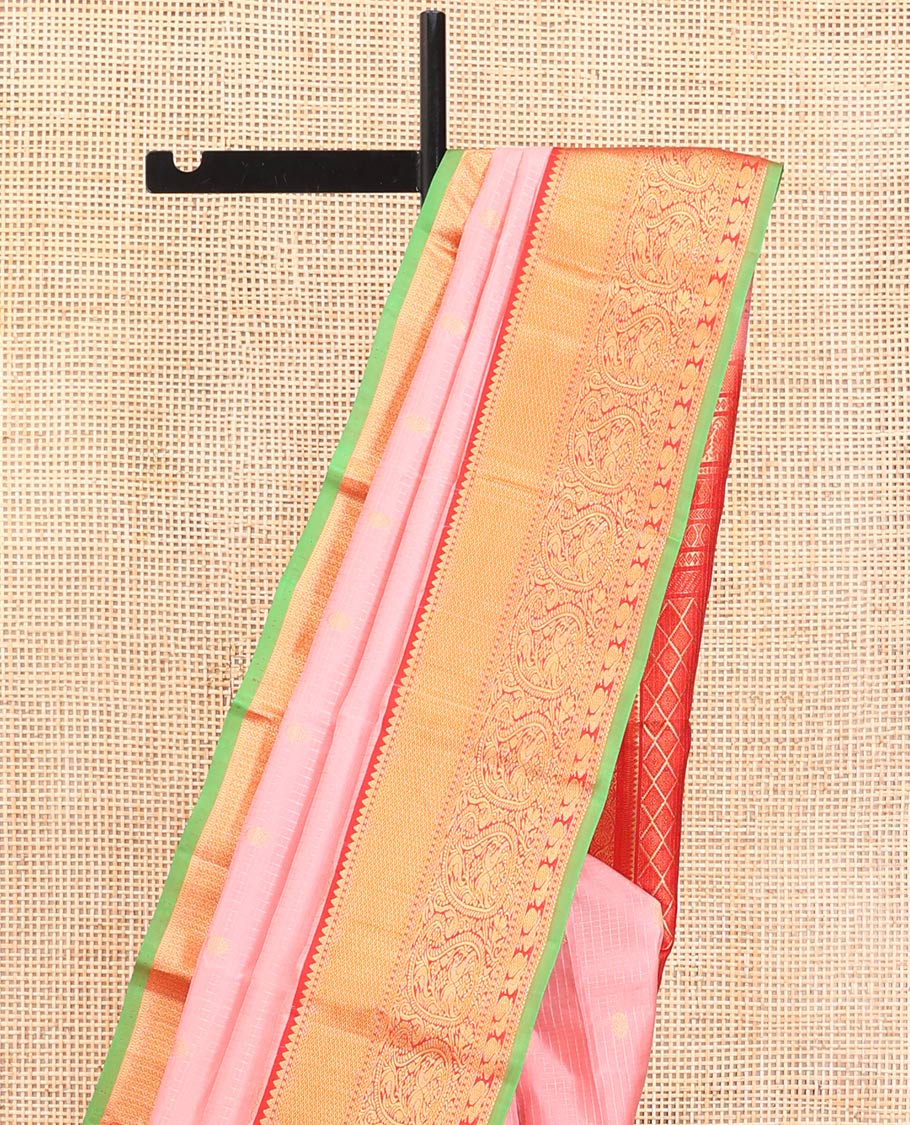 Pink Vasundhara Silk Saree, Decked Up with Zari Buttas and Stripes All Over Its Body, Complemented by a Contrast Border of Rekku, Kodi Visiry, Jaal, and Mayil Designs, Grand Jaal Pallu, and Paired with a Contrast Blouse