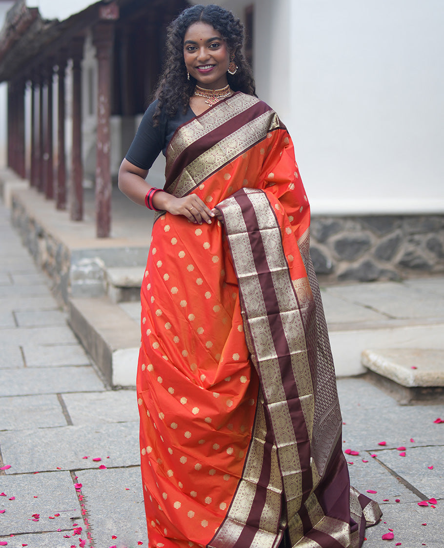 Orange-Brown Budget Silk Saree Features Zari Buttas, Complemented by Contrast Rettai Pettu Traditional Zari Border, Paisleys Pallu, and a Contrast Blouse