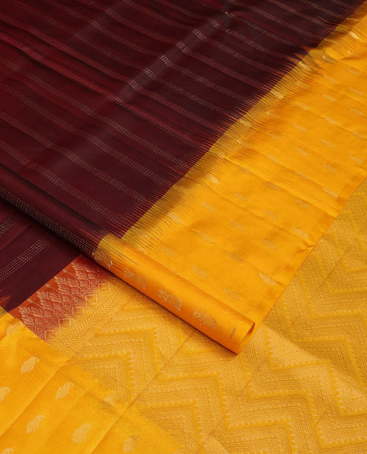 Maroon zari stripes soft silk saree, contrast temple zari buttas border & chevron patterned pallu