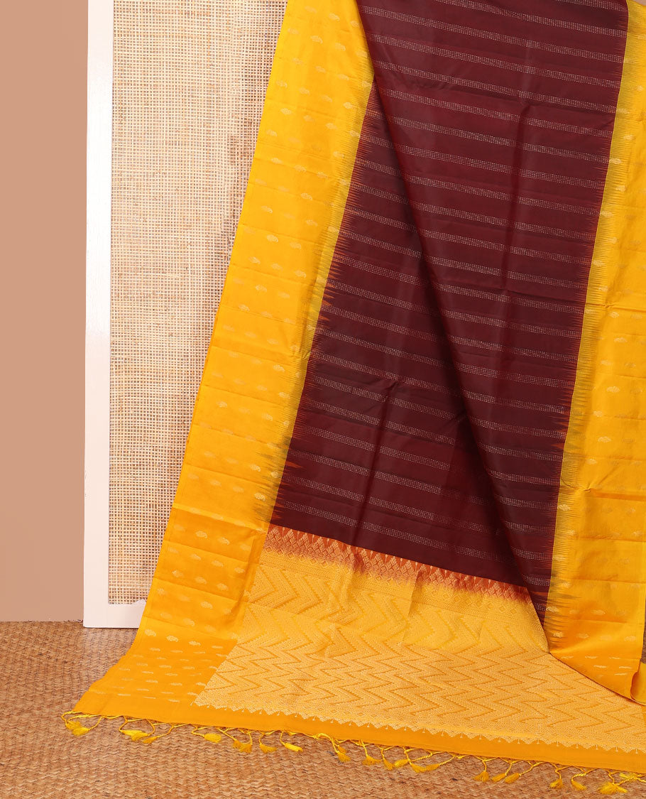Maroon zari stripes soft silk saree, contrast temple zari buttas border & chevron patterned pallu