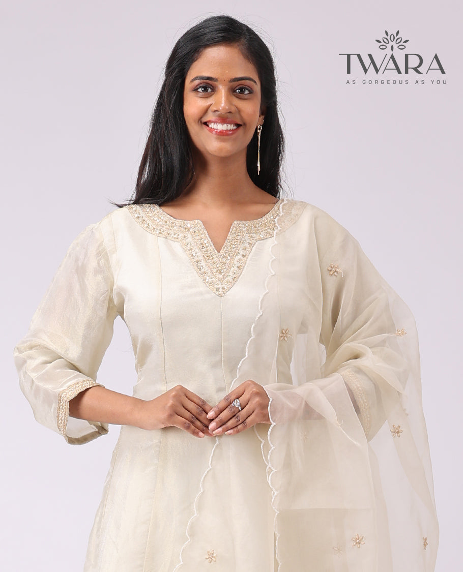 Twara cream floral embroidered v neck, 3/4 th sleeve , below knee lenght with straight pant & scallop border dupatta