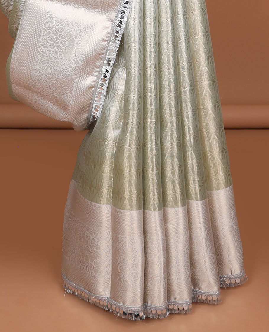 Light green jacquard tissue saree with self floral zari design border & intricate zari design pallu
