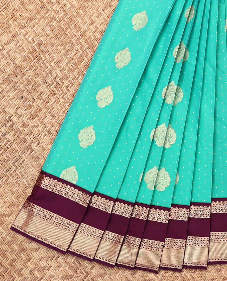 Turquoise Budget Silk Saree, Mesmerized with Zari Buttas, Complemented by a Contrast Traditional Zari Rettai Pettu Border, Grand Pallu, and a Contrast Blouse