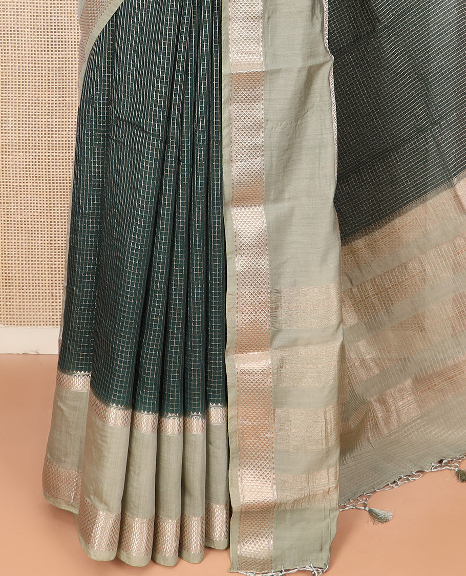 Dark Green Assam Silk Saree Sparsely Sparkled with Zari Checks, Complemented by Contrast Zari Border of Triangle Motifs, a Gleaming Pallu of Zari Stripes, and Paired with a Contrast Blouse