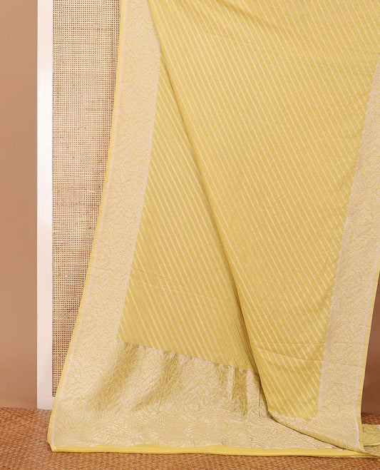 Yellow diagonal striped fancy crepe saree, self-border & pallu of zari designs