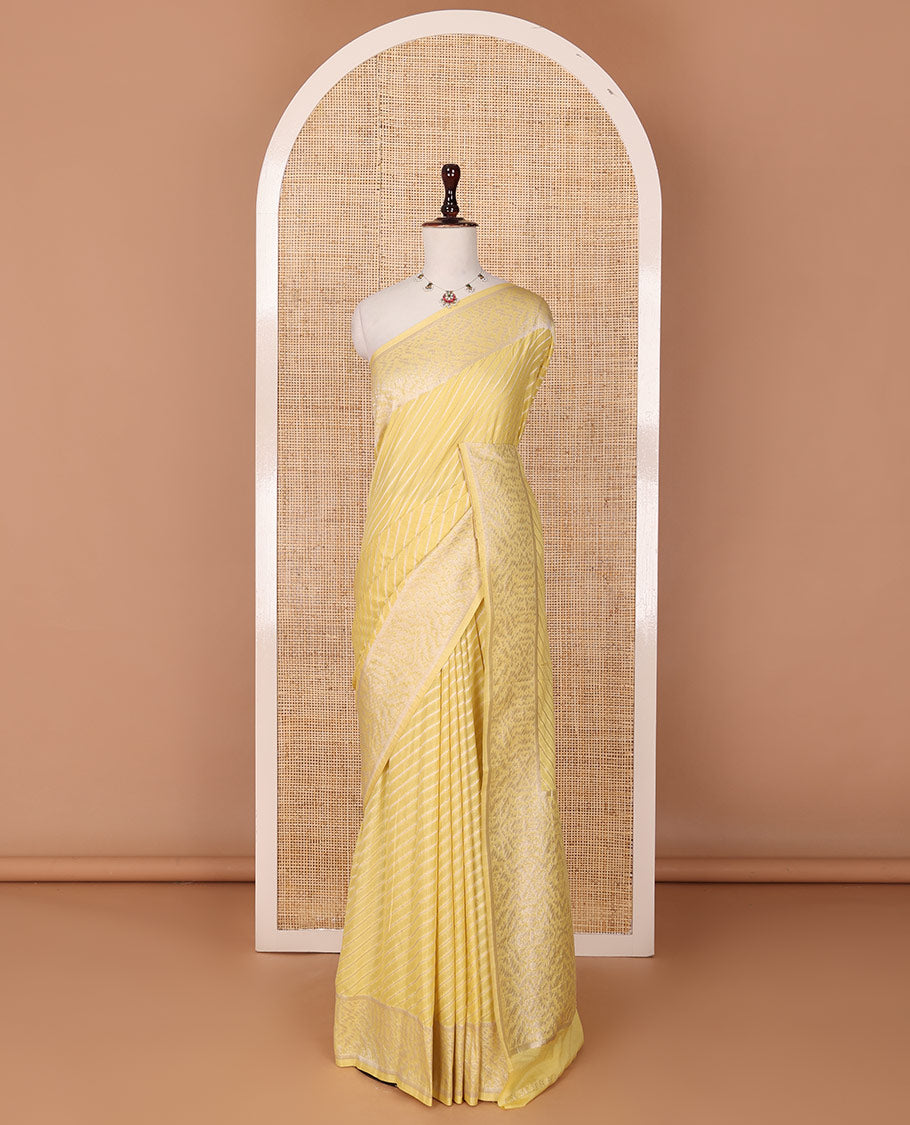 Yellow diagonal striped fancy crepe saree, self-border & pallu of zari designs