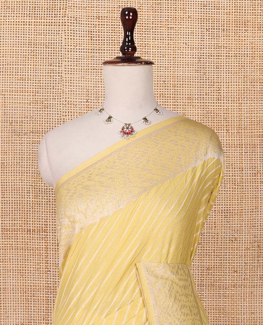 Yellow diagonal striped fancy crepe saree, self-border & pallu of zari designs