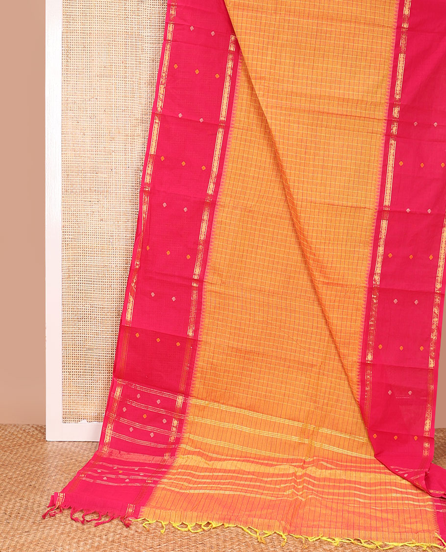 Orange checked Chettinad cotton saree, contrast traditional design border, and pallu of stripes