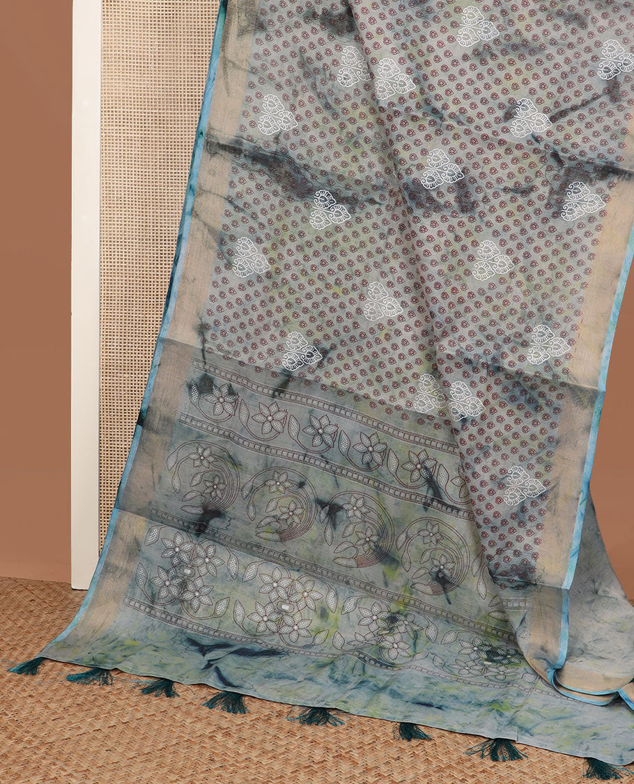 Light blue shibori printed with leaf motifs, printed cotton saree, bavanji border, and floral design pallu