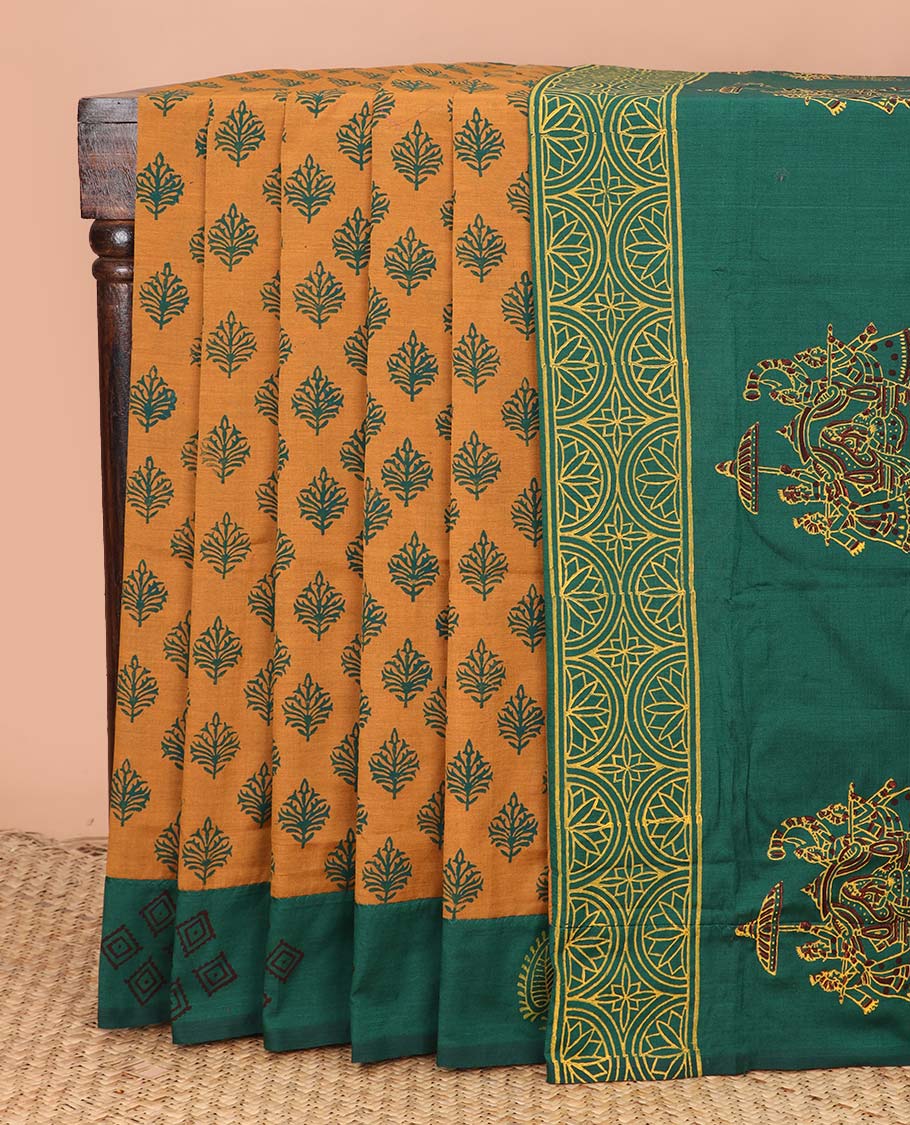 Orange floral motifs printed poly cotton saree, contrast block printed border, and wedding motifs printed pallu