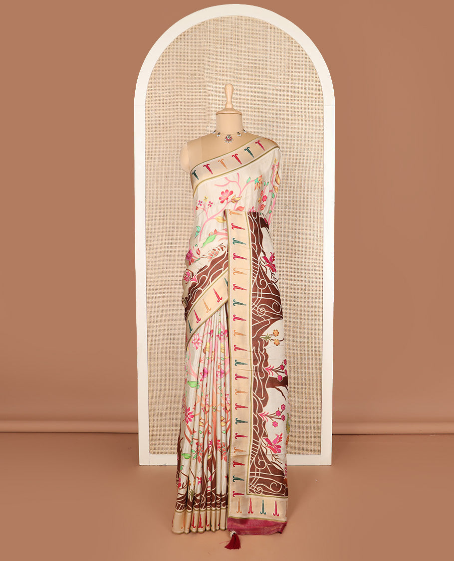 Cream colorful floral vine printed dola silk saree, muniya border, and tropical floral printed pallu