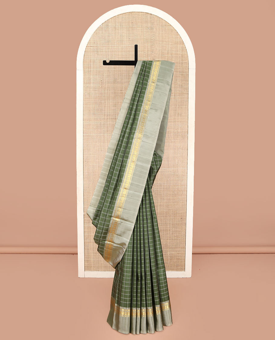 Olive Kanchipuram Silk Saree, Enthralled with Medium-Sized Checked Design All Over Its Body, Complemented by a Contrast Kal Eragina Border of Thilakam Mokku, Banaras, Muthu, and Mayil Designs, Subtly Striped Pallu, and Paired with a Contrast Blouse