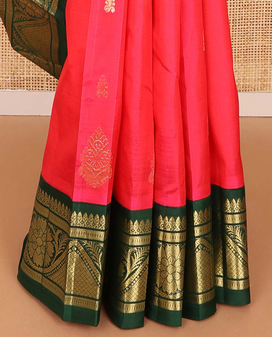 Red buttas kancheepuram silk saree with contrast border of thilakam mokku, banaras, muthu design & floral pallu