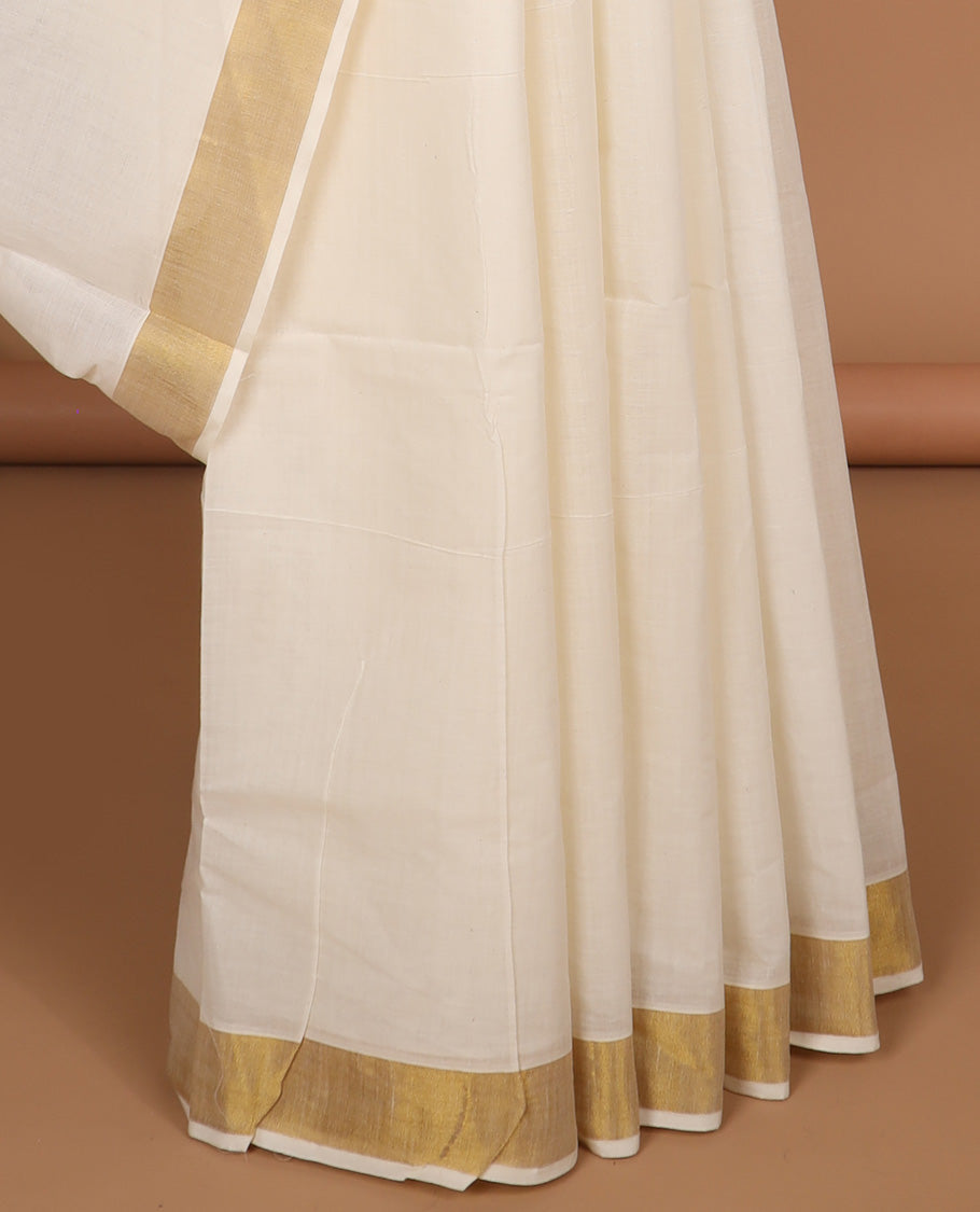 Cream plain design kerala saree, zari border & pallu of zari designs