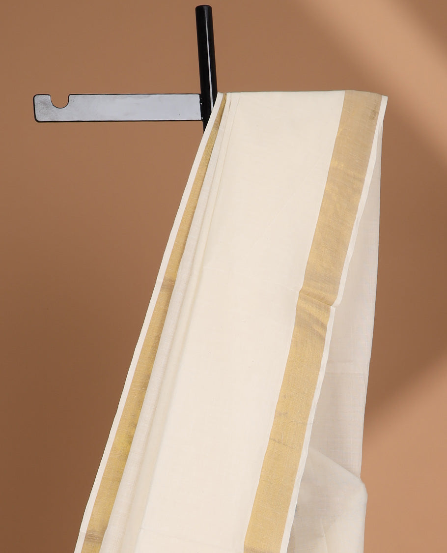 Cream plain design kerala saree, zari border & pallu of zari designs