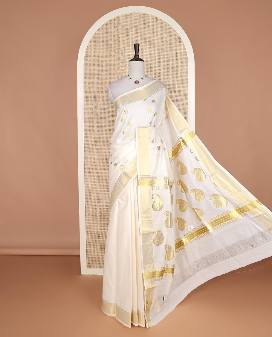 Cream paisley zari buttas Kerala cotton saree, paisley zari border, and zari paisley pallu