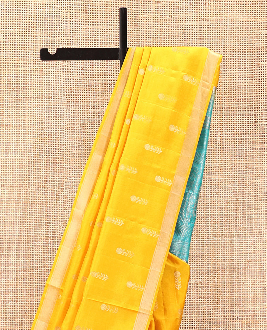 Yellow Mayuri Soft Silk Saree, Subtly Sparkled With Zari Buttas All Over Its Body, Complemented by Contrast Pallu of Intricate Designs, and Paired with a Contrast Blouse