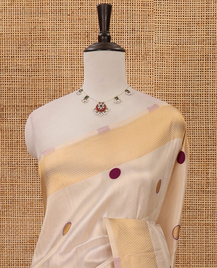 Cream small violet polka dots banarasi tissue saree, zari border, pallu of violet polka dots & running plain blouse