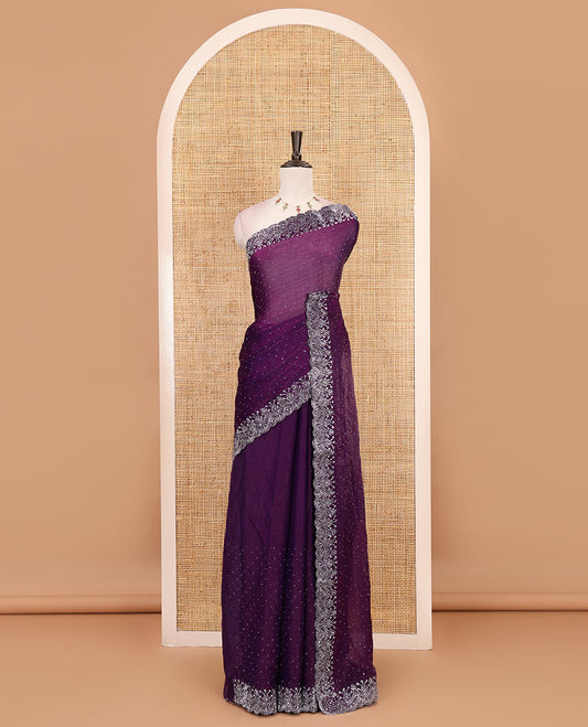Violet Swarovski crystal stone embedded fendy chiffon saree, scallop border accentuated with floral and scallop design in Swarovski stones