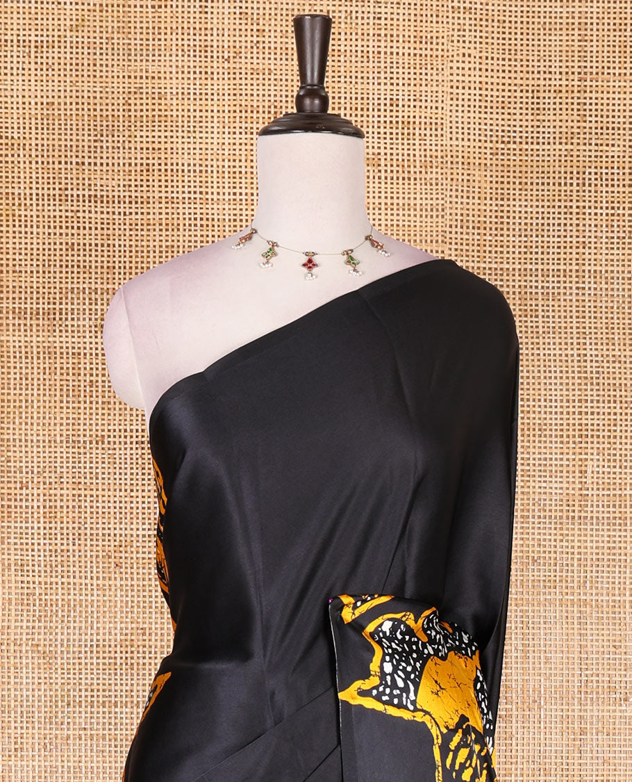 Borderless black-yellow batik style abstract digital printed satin crepe saree with blouse of small buttas