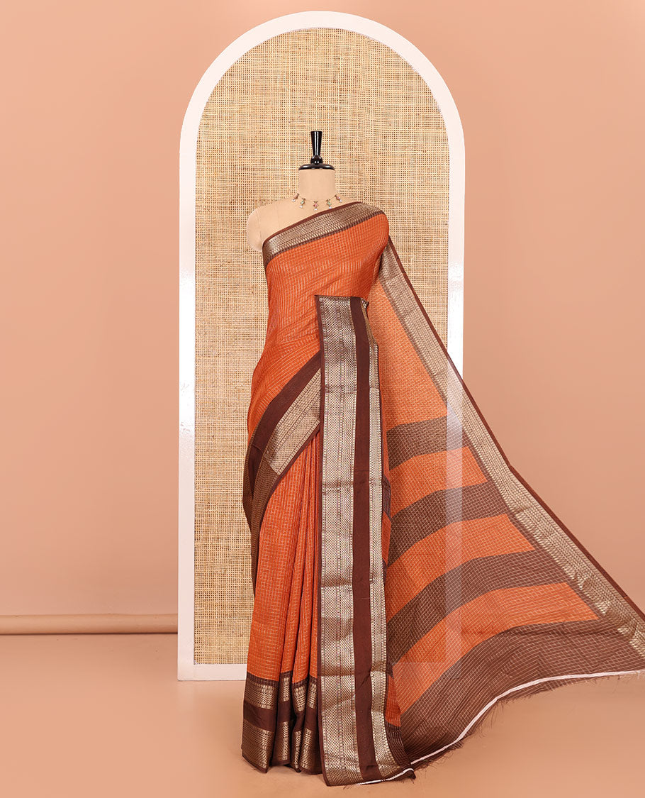Rust orange checked moss chiffon saree with contrast traditional zari design border, checked pallu, and a contrast zari design blouse