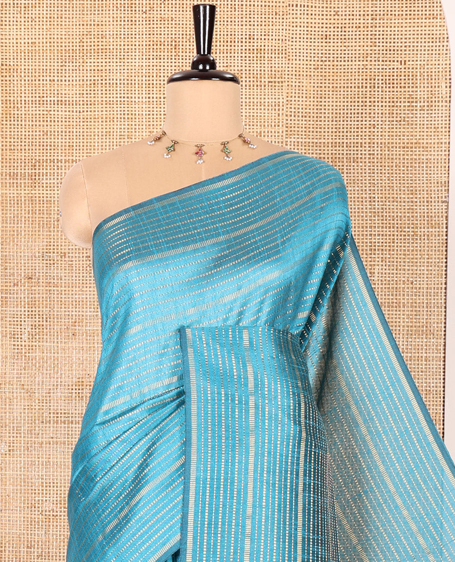 Borderless Blue Semi-Raw Silk Saree Highlighted with Gold-Zari Horizontal Stripes All Over Its Body, Complemented by a Contrast Pallu of Stripes, and Paired with a Contrast Blouse