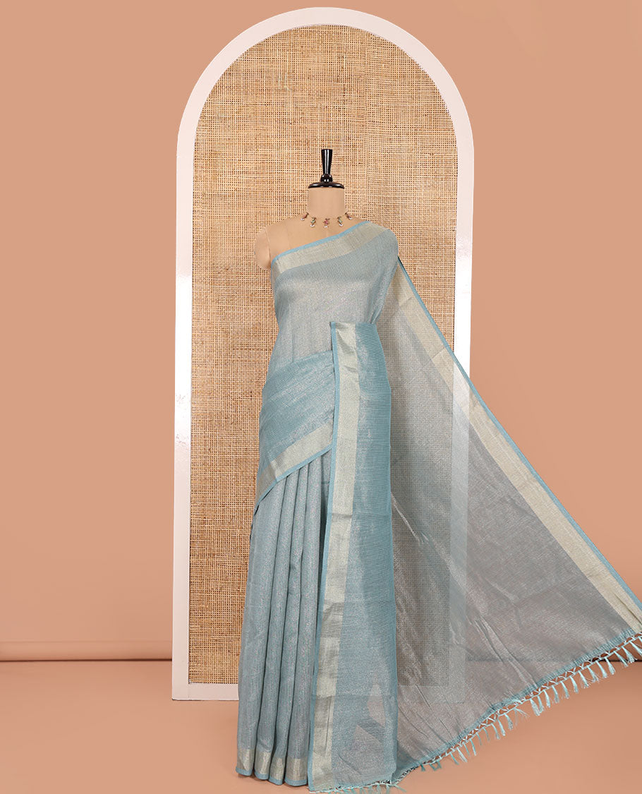 Blue Tissue Saree, Gleamed Up with Zari Striped on Its Body, Highlighted by a Zari Border, Pallu Steeped with Zari Stripes, and Paired with a Matching Blouse