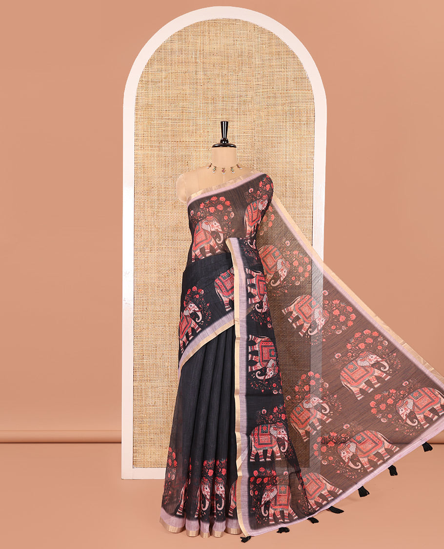 Black Plain Linen Cotton Saree, Artfully Detailed with Elephant Motifs on Piping Border, Pallu of Elephant Motifs Print, and Paired with a Contrast Blouse